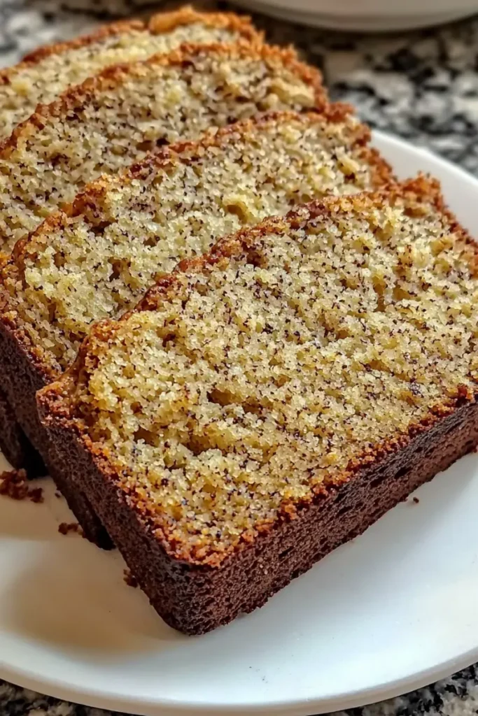 Slices of butter-free banana bread with a golden crust.