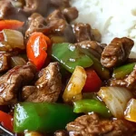 high-quality close-up of sizzling pepper steak